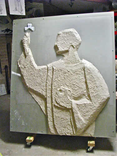 St Patrick sculpture  - early stage clay modeling of 'Confessio' icon (top half